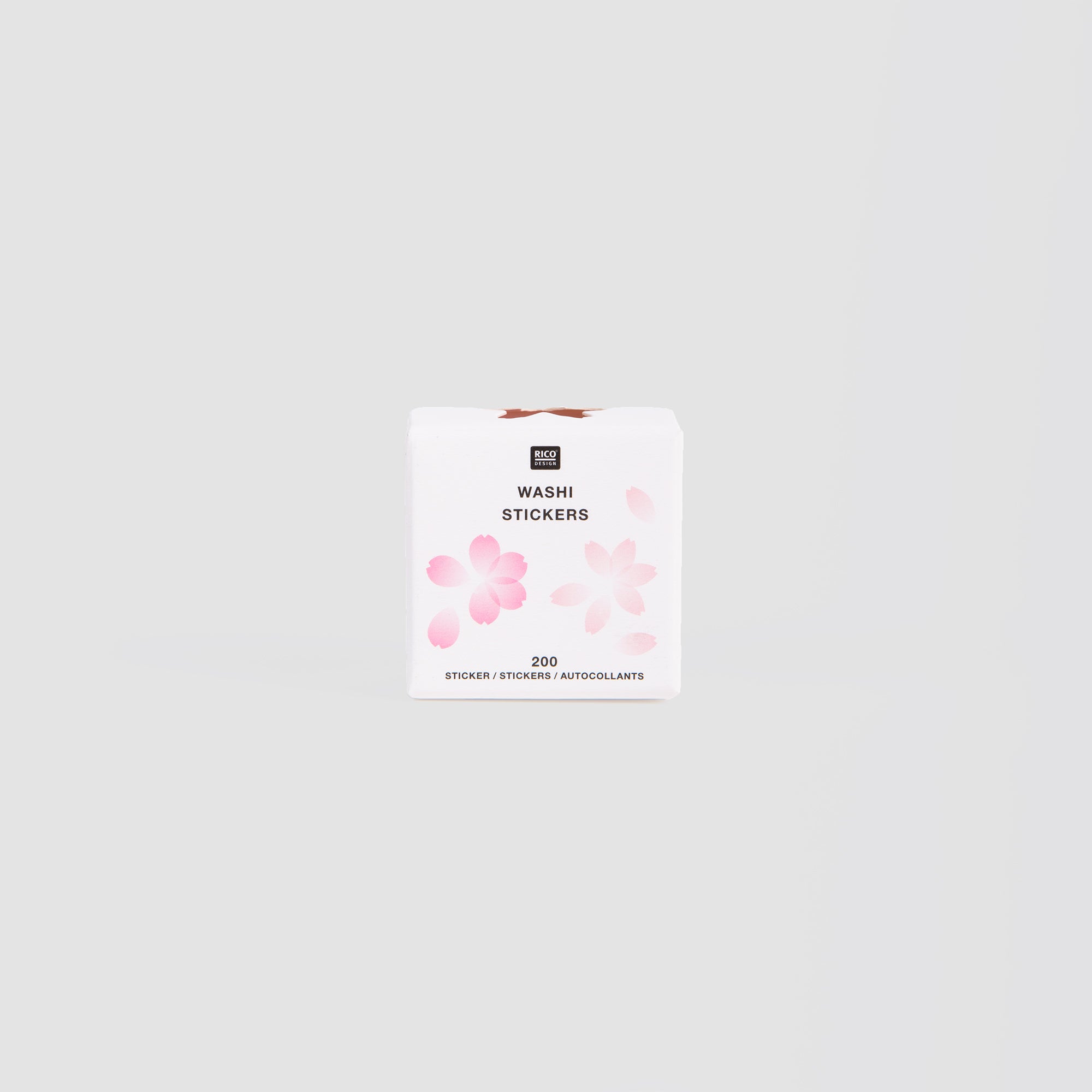 Eine weiße Verpackung mit der Aufschrift „Washi Tape ‚Kirschblüte‘“ von Paper Poetry präsentiert rosa Kirschblüten-Motive mit fettgedruckten „Washi Stickers“. Die minimalistische Verpackung aus Reispapier enthält 200 Stück auf schlichtem hellgrauem Hintergrund.